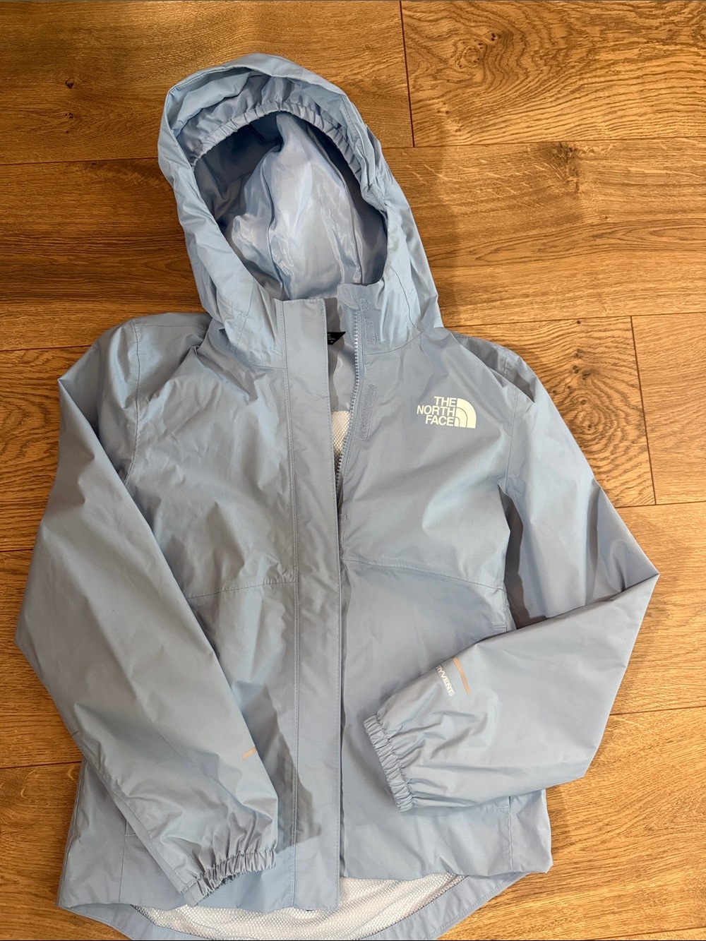 The North Face Light Blue Kids' Hooded Rain Jacket